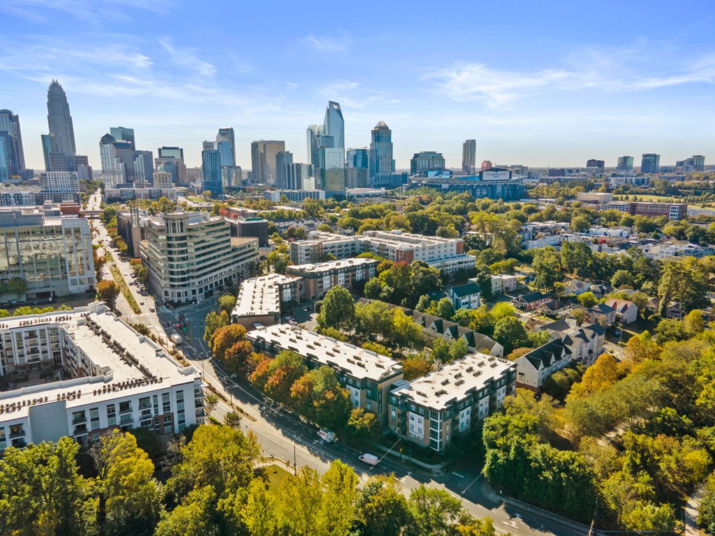 Flatiron West Trade Apartments aerial view with Charlotte skyline in background