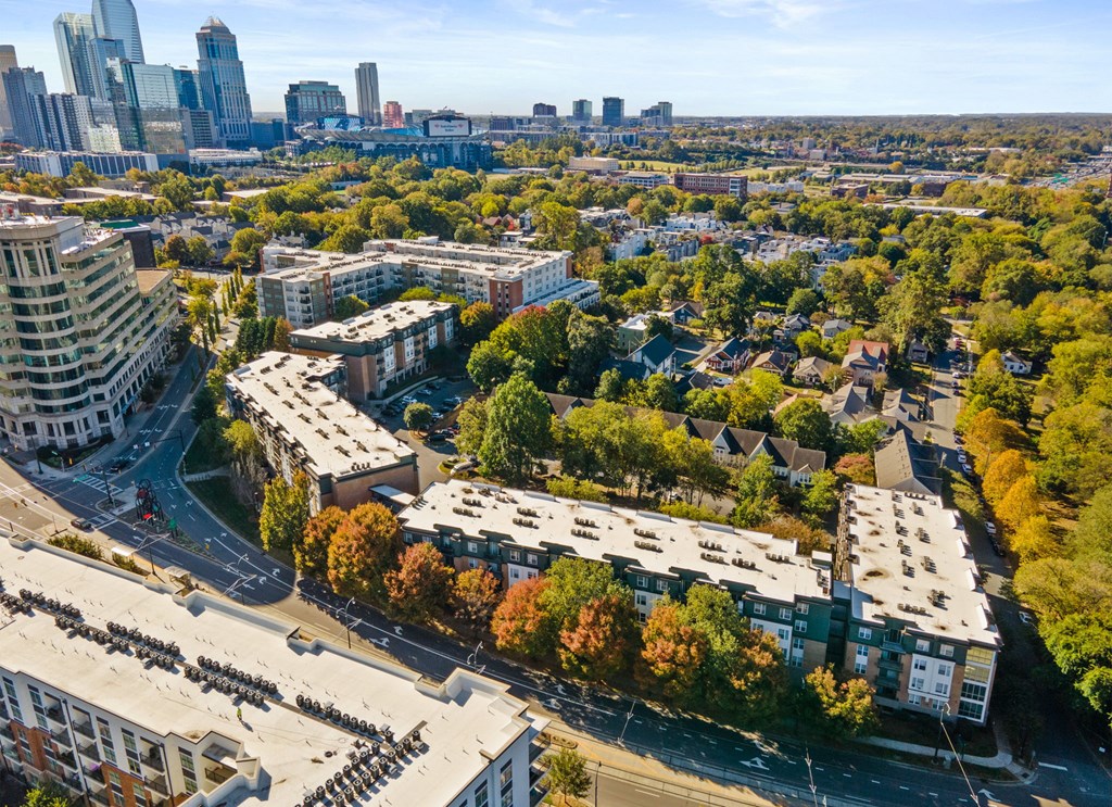 Flatiron West Trade Apartments aerial view with Charlotte skyline in background