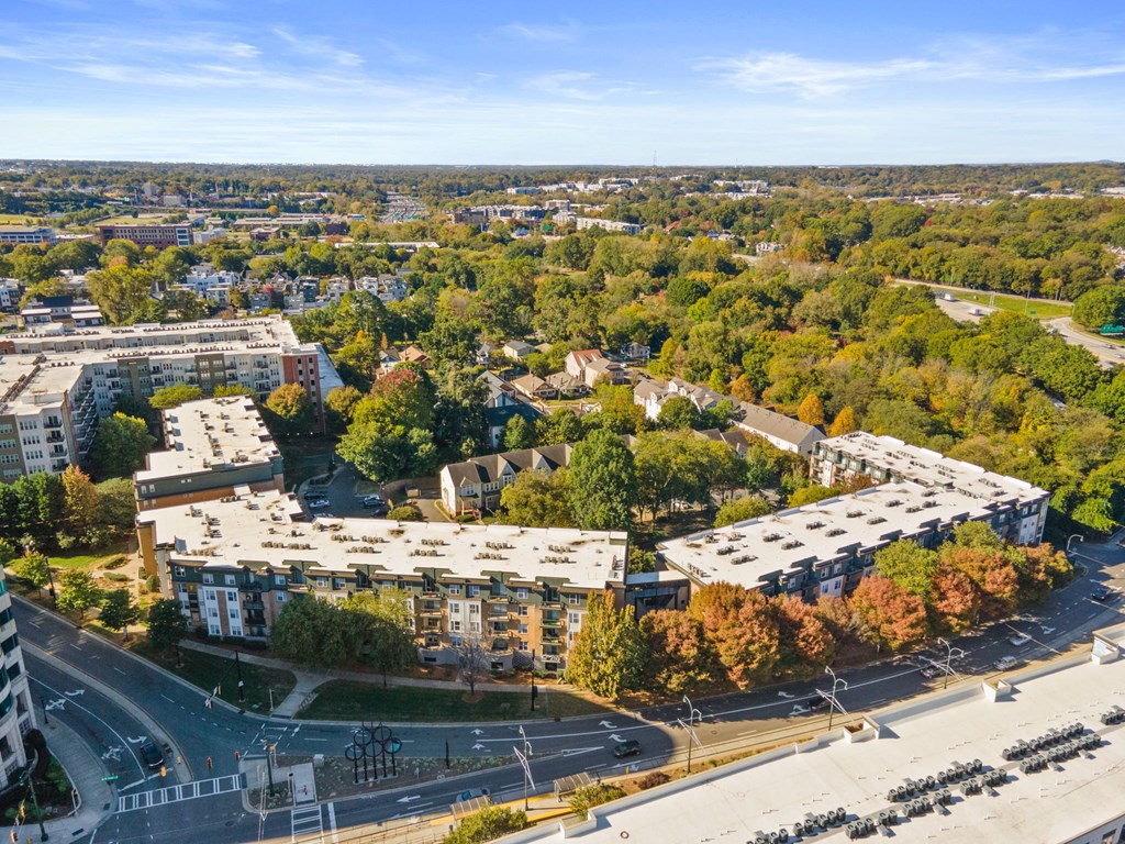 Flatiron West Trade Apartments aerial view with Charlotte skyline in background