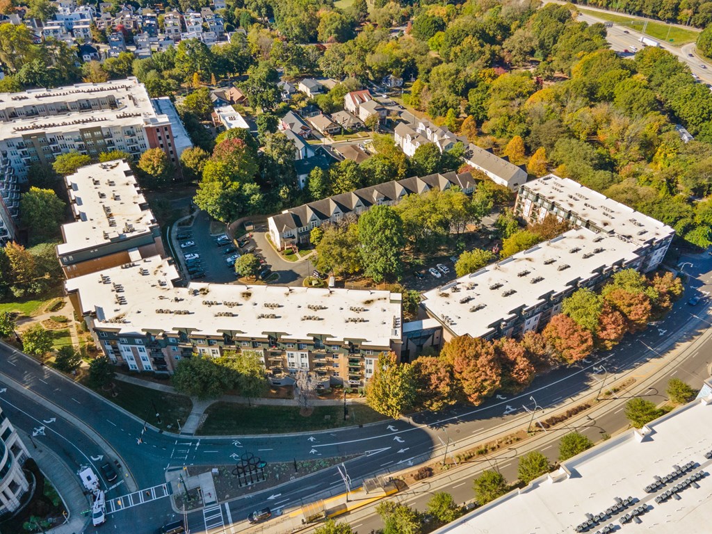 Flatiron West Trade Apartments aerial view with Charlotte skyline in background