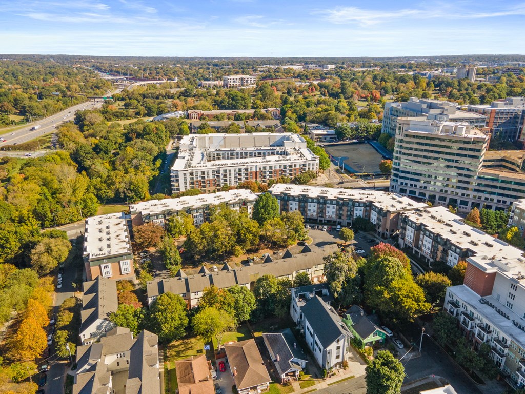 Flatiron West Trade Apartments aerial view with Charlotte skyline in background