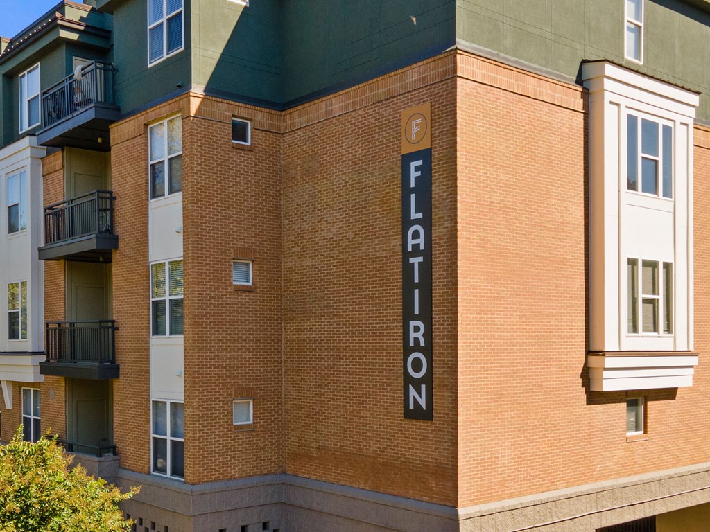 Flatiron West Trade Apartments exterior view of building with "Flatiron" on the side