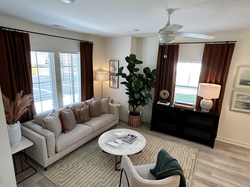 a living room with a couch and a table