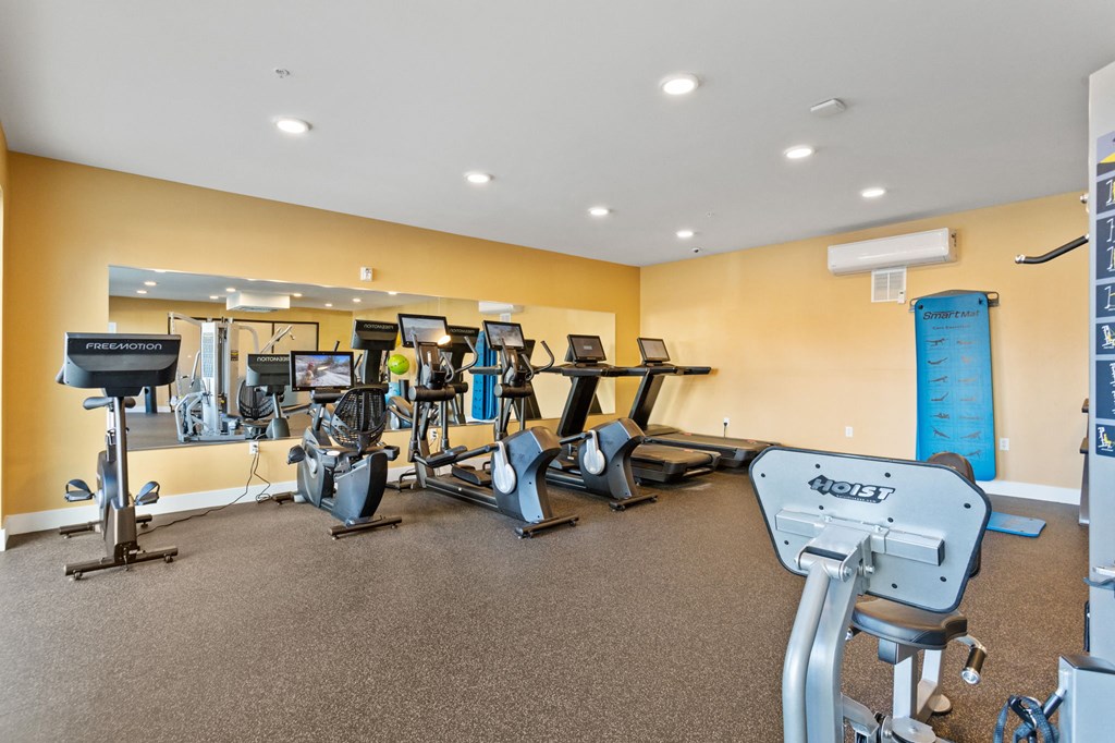 Fitness Center in Park View Greer Apartments in Greer, SC with free weights, treadmills, stationary bikes and yoga mats