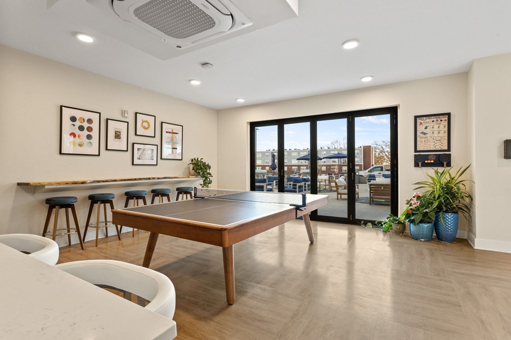 Kitchen space in clubhouse of Park View Greer Apartments in Greer, SC featuring a ping pong table
