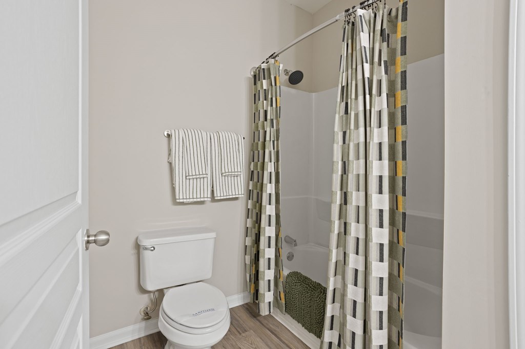 Flatiron West Trade Apartments Bathroom with shower/tub