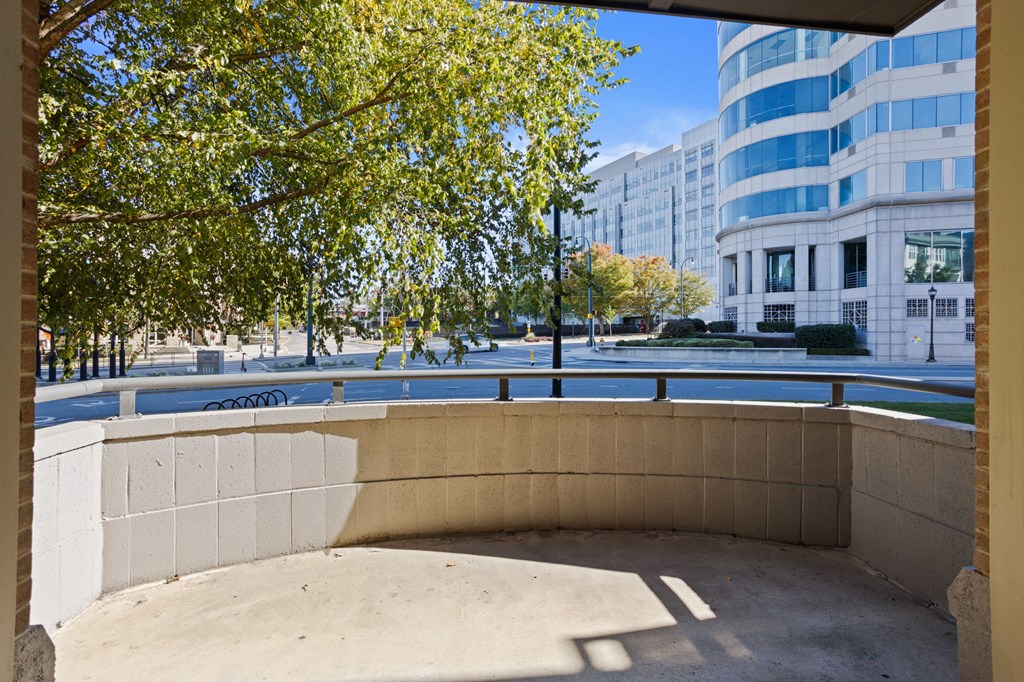 Flatiron West Trade Apartments patio with cement flooring