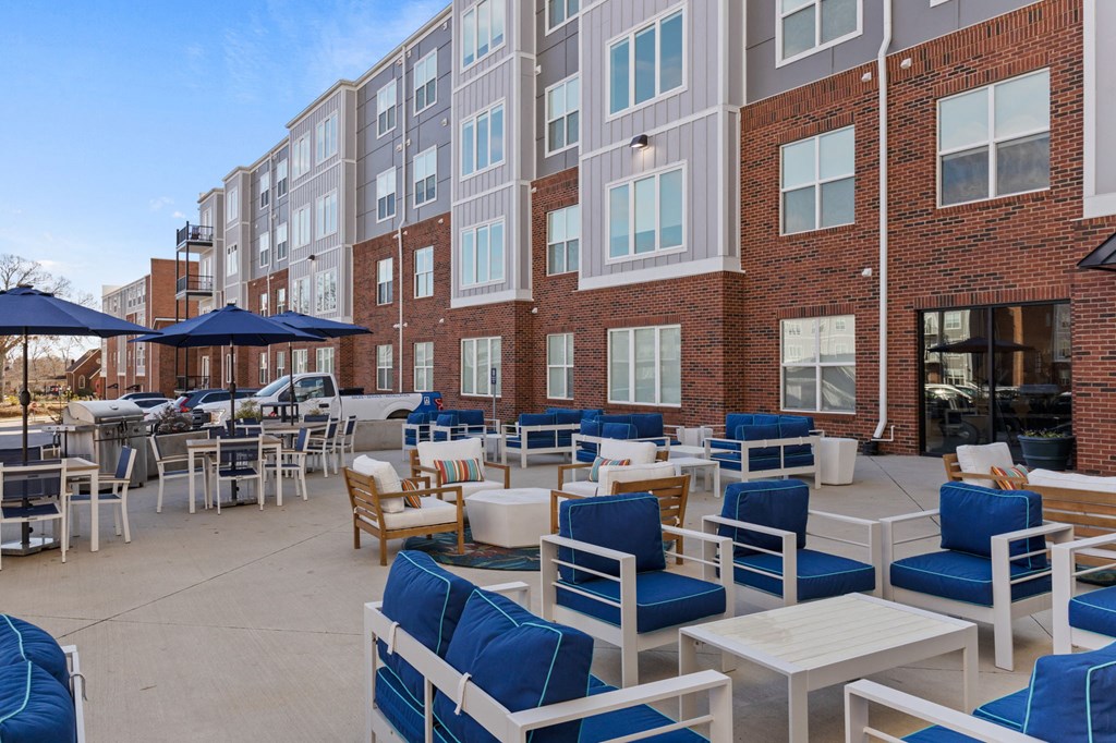 Patio with blue chairs in Park View Greer Apartments in Greer, SC