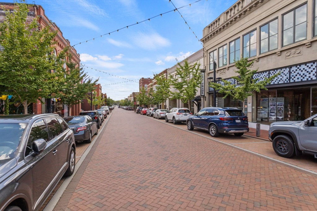 Brick paved street with string lights in downtown Greer, SC