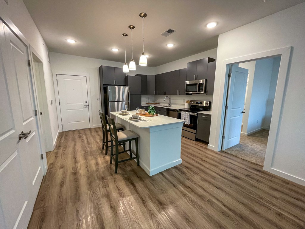 The kitchen and dining area of The Alston Apartments.