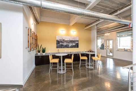 Converse Mill Lofts Apartments in Spartanburg SC with tables and chairs