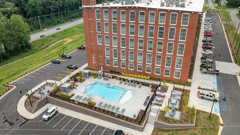 Aerial View of Converse Mill Lofts Apartments in Spartanburg SC, facing the pool