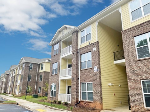 Apartment building with the number 110 on the front.