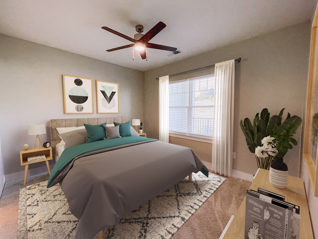 Luxury Apartments Near Greenville, SC - Falls at Meehan - Spacious Bedroom With Plush Carpeting, A Ceiling Fan, And Large Window