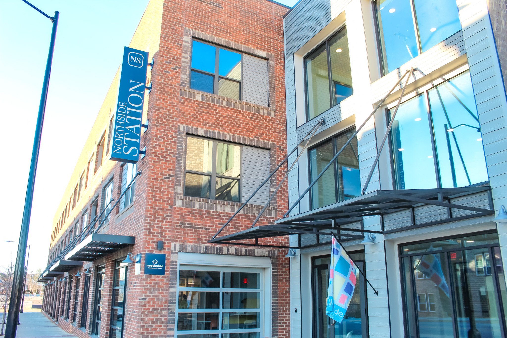 A building with a sign that says "NORTH SIDE STATION".