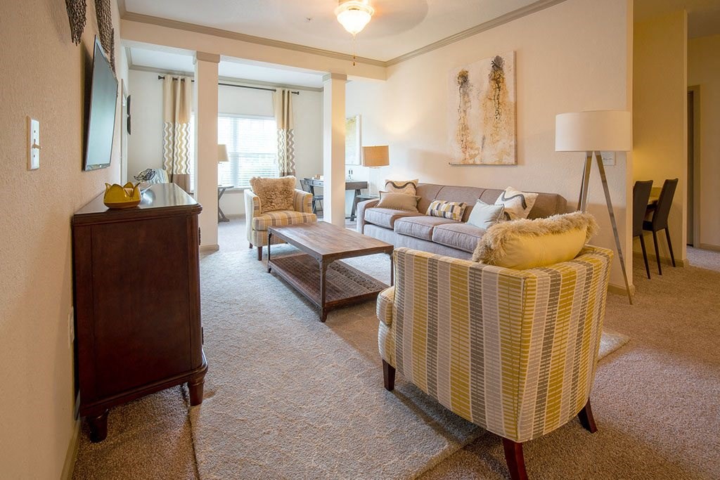 a living room with a couch and a table