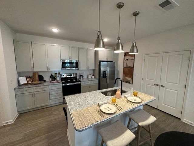 a kitchen with a marble counter top