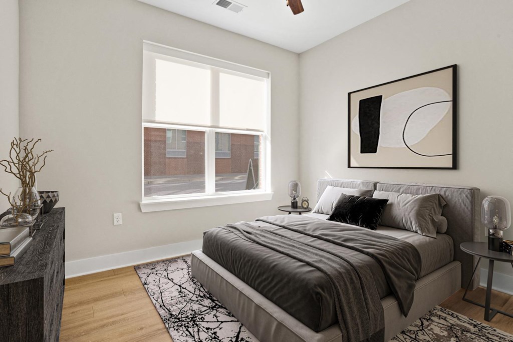 1-Bedroom Luxury Apartments in Greer, SC - Park View Greer - Bedroom Featuring Wood-Style Flooring and a Ceiling Fan