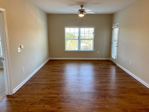 Linden Square Apartments living room with hardwood-style floors
