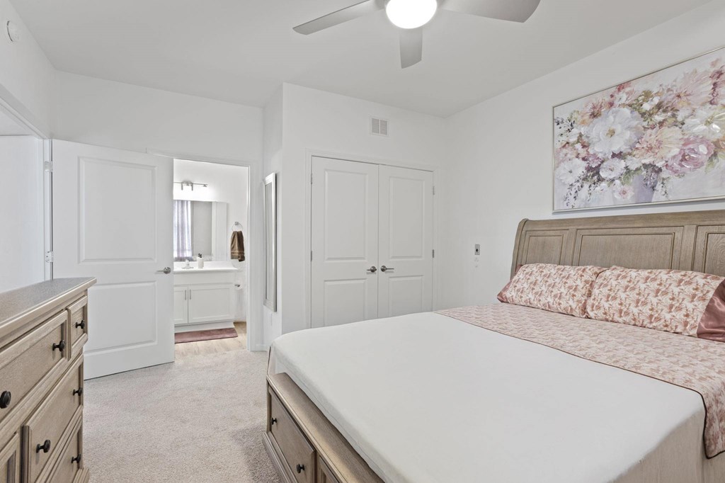 Ovata at Reedy Creek bedroom with carpet and ceiling fan