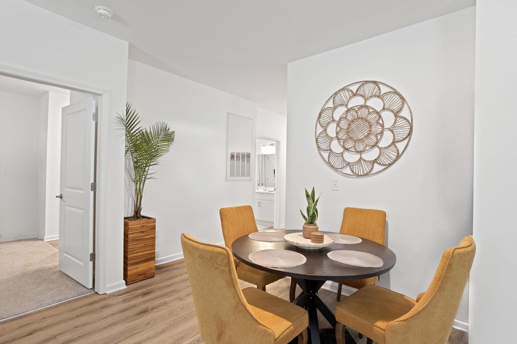 Ovata at Reedy Creek living room with LVT flooring and ceiling fan