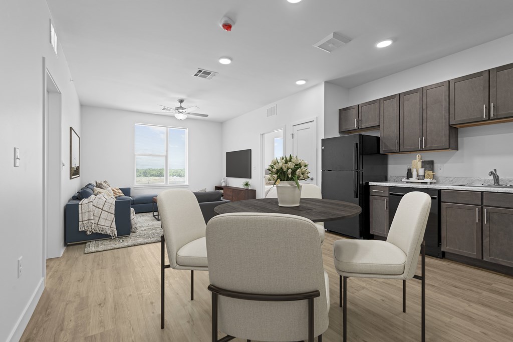 Modern kitchen with a dining table at 36N Apartments, Tulsa