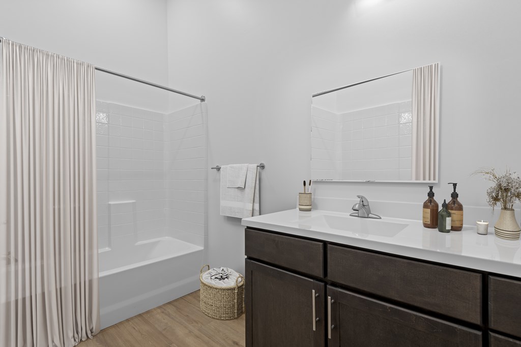 Bathroom with a white sink at 36N Apartments, Tulsa