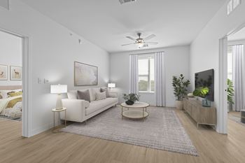 Living room with a white couch at 36N Apartments, Oklahoma, 74106