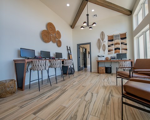 A room with wooden floors and furniture.