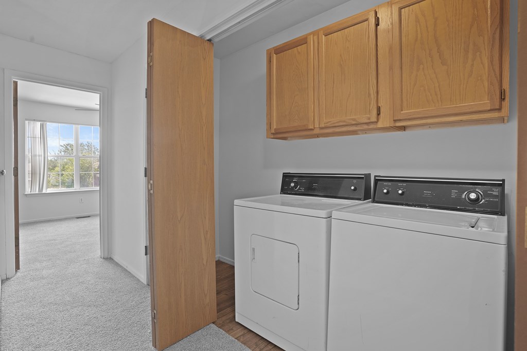 A laundry room with a washer and dryer.
