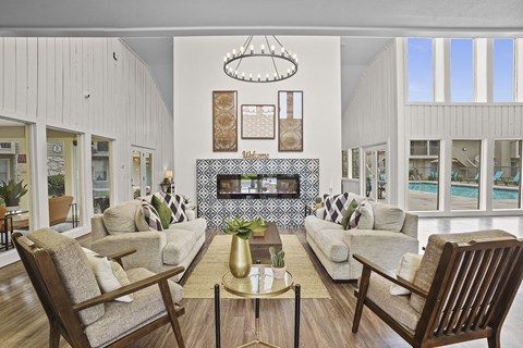 A living room with a fireplace and a couch.