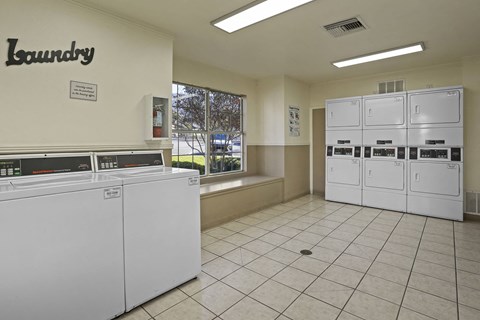 A laundry room with a washer and dryer.