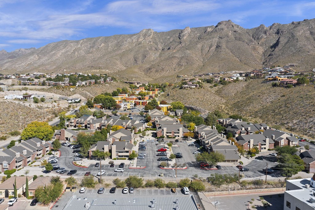 A small town with a mountain in the background.