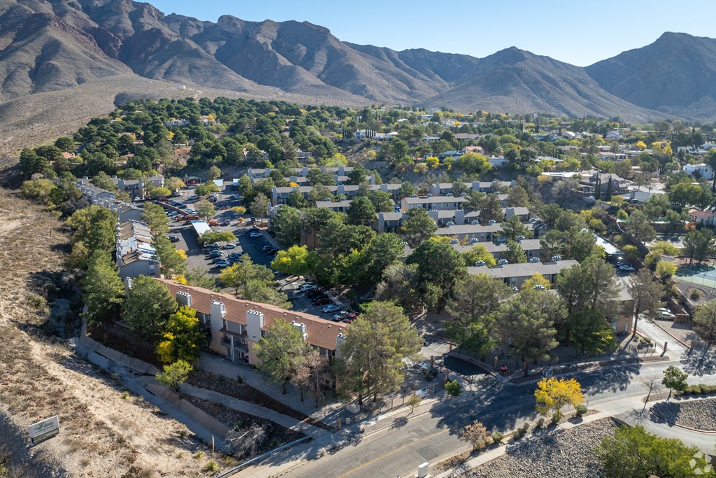 A small town with a mountain in the background.