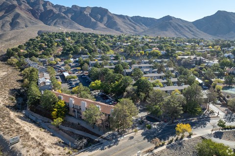 A small town with a mountain in the background.