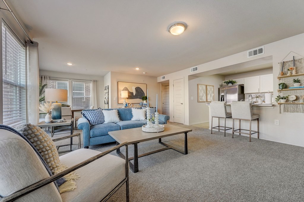 a living room with a couch and a table