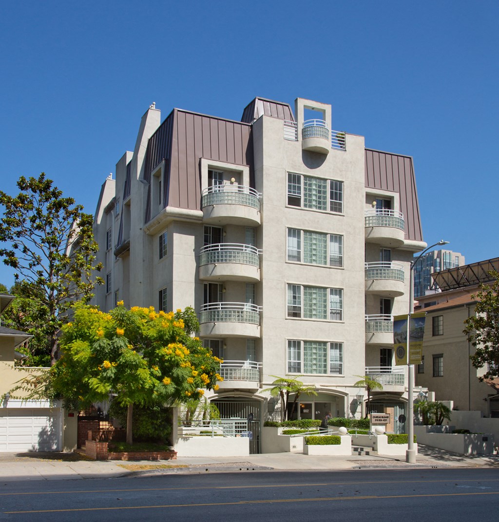 Elevated view of the front exterior of an apartment building.