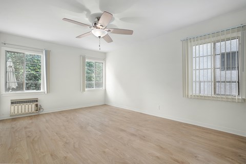 Apartment bedroom with windows