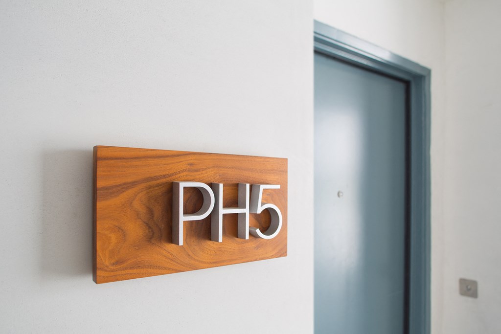 Apartment unit identification sign