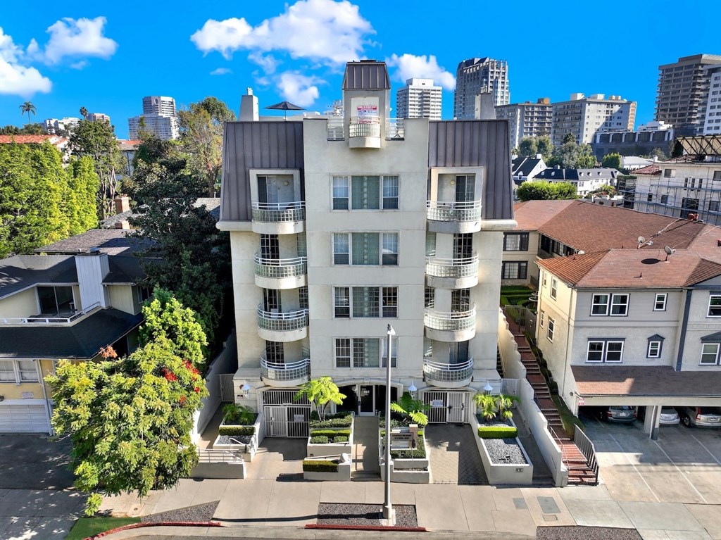 Exterior aerial view of apartment building.