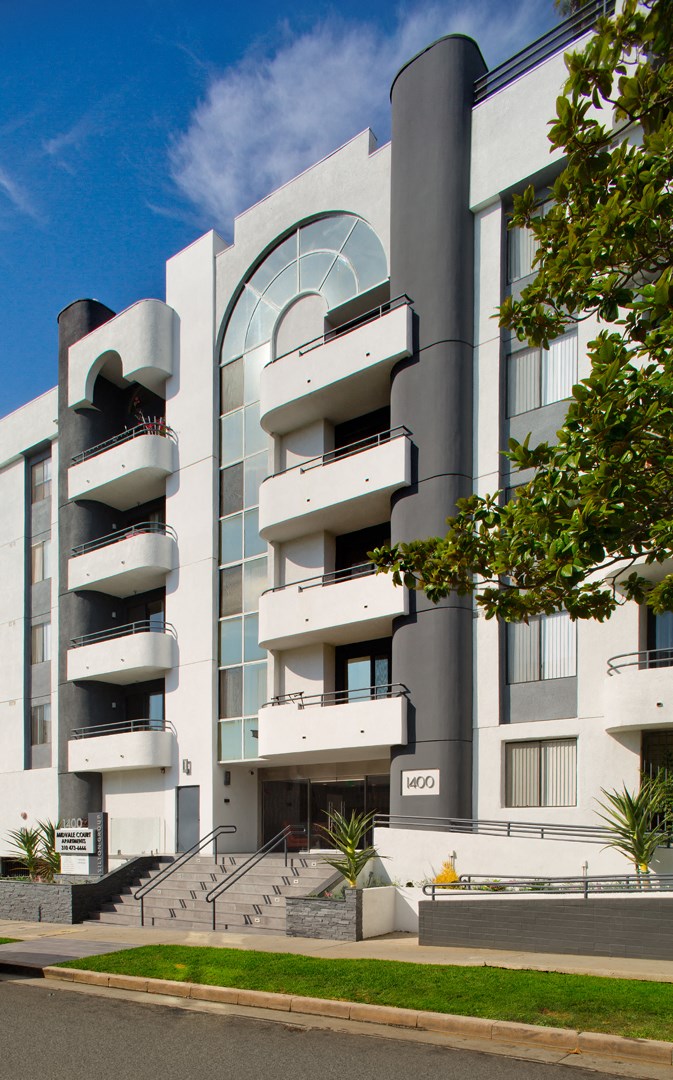 Exterior 3/4 angle of an apartment building. at Midvale Court, Los Angeles, CA