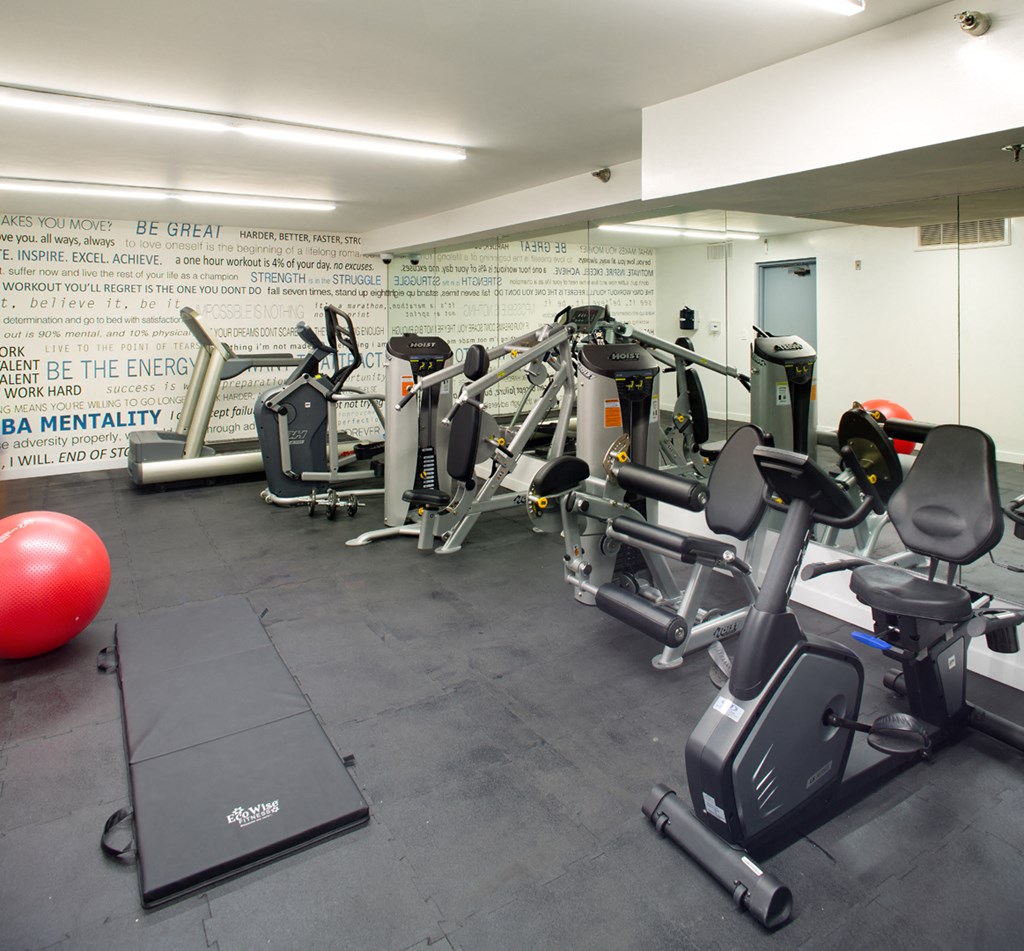 Apartment fitness center with gym equipment. at Midvale Court, Los Angeles, CA