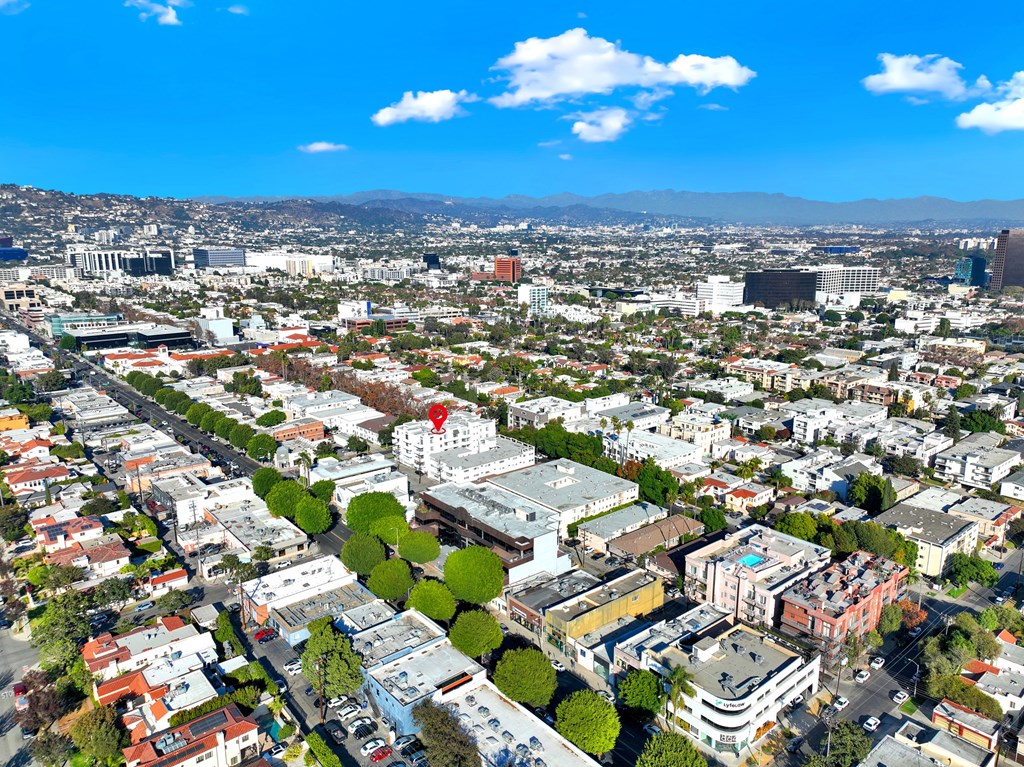 A cityscape with buildings and roads under a clear sky A cityscape with buildings and roads under a clear sky at Beverly Wooster Apartments, Los Angeles, CA 90035