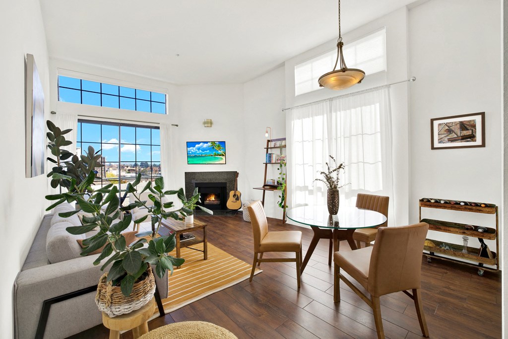 A living room with a fireplace and a TV on the wall at Beverly Wooster Apartments, Los Angeles, 90035
