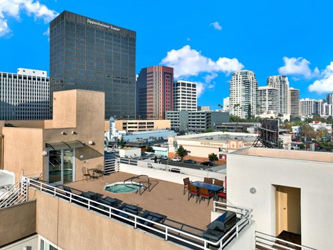 A view of a cityscape with a pool on the balcony of a building at Peach Tree Court, Los Angeles, 90024