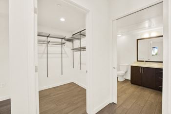 A bathroom with a walk-in shower and a toilet at The Urbanpolitan, Los Angeles, CA