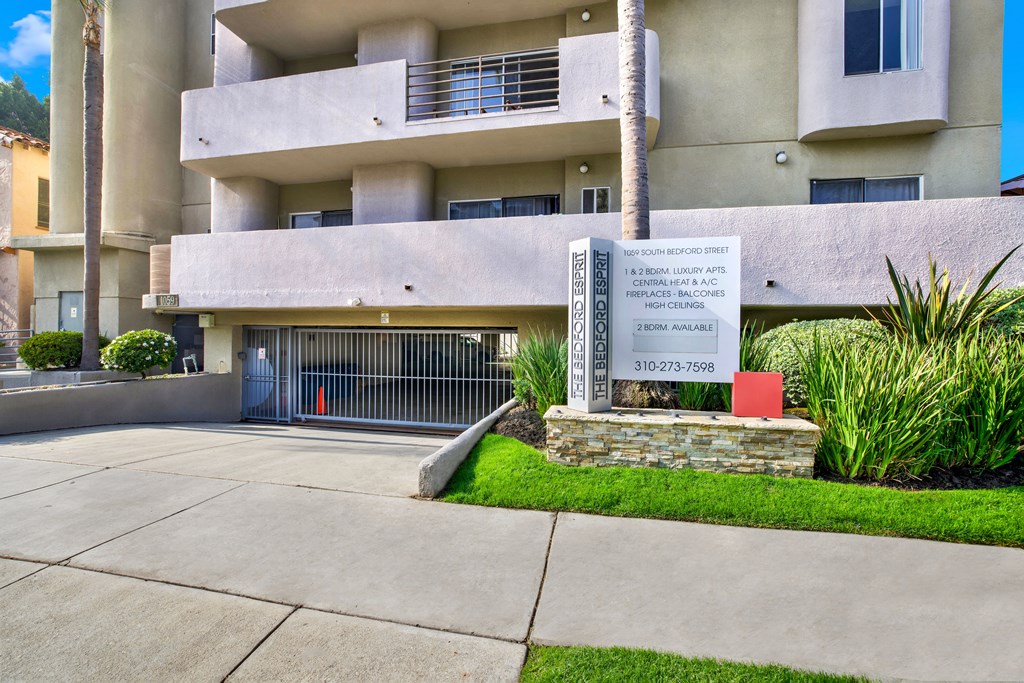 A sign in front of a building that says "The Second Floor".