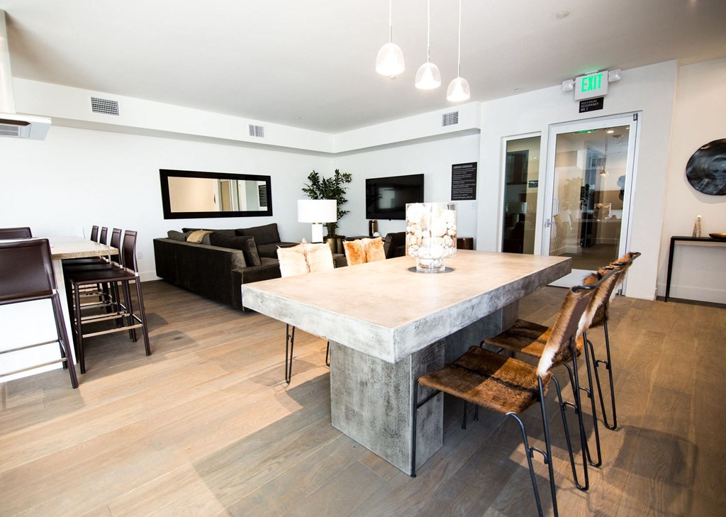 Community lounge with dining and furniture