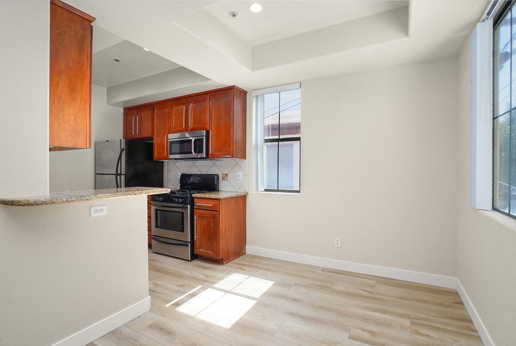 Apartment dining room area and kitchen