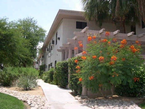 A white building with a number 45 on it.